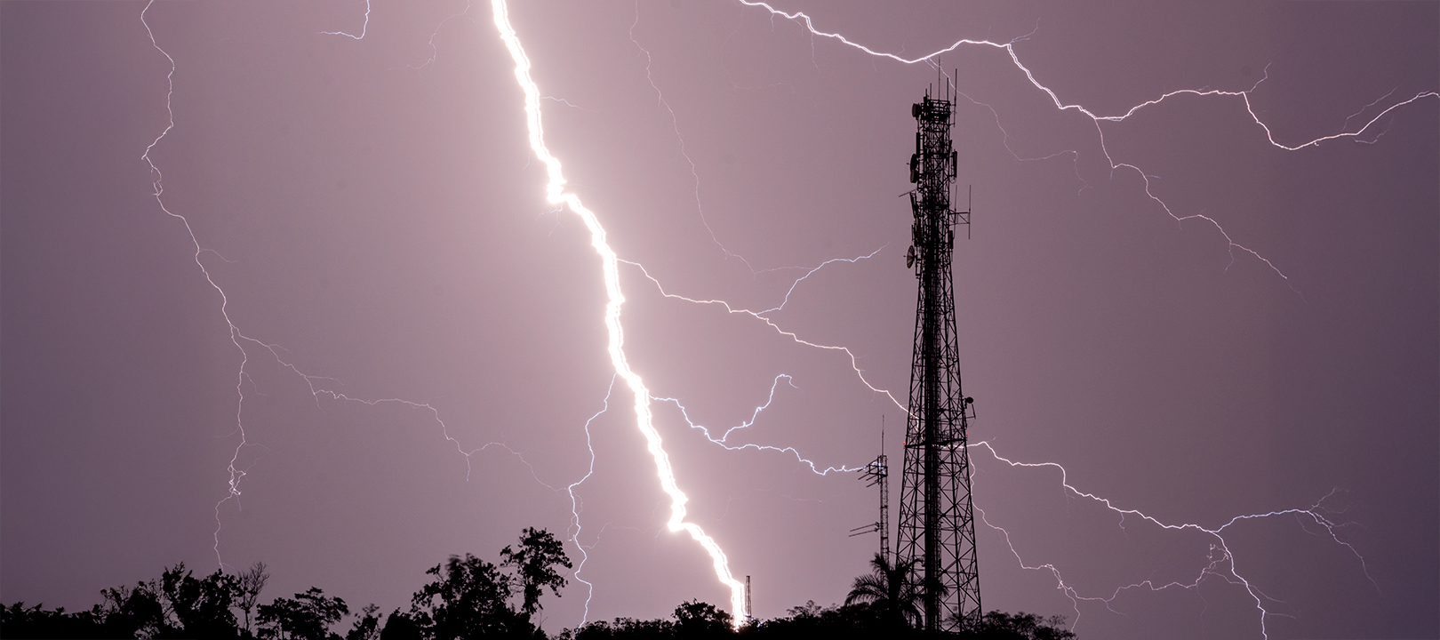 Lightning strike near a transmission tower. In Espera Feliz, sta